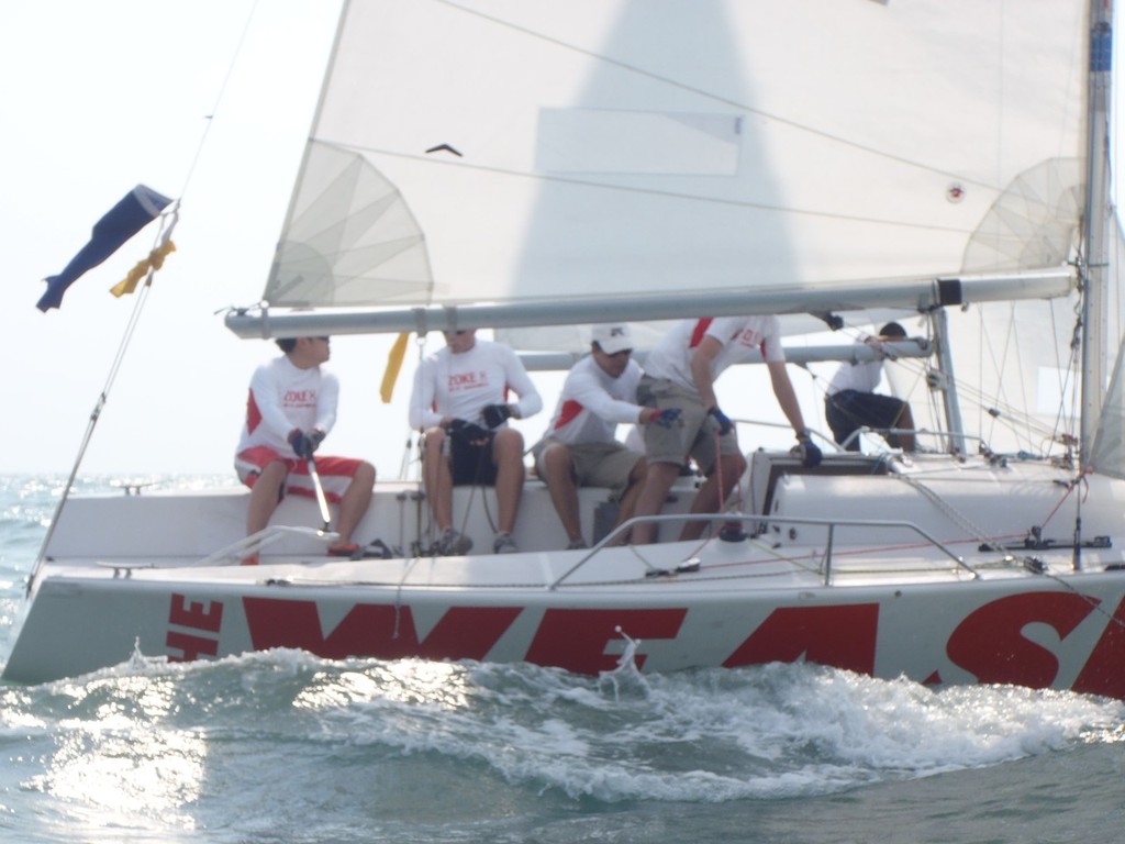 Chin Yew (HK) race a Singaporean Team in a MatchraceThailand event March 2011 © Alex Samaras